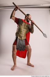 Man Adult Average White Fighting with spear Standing poses Casual